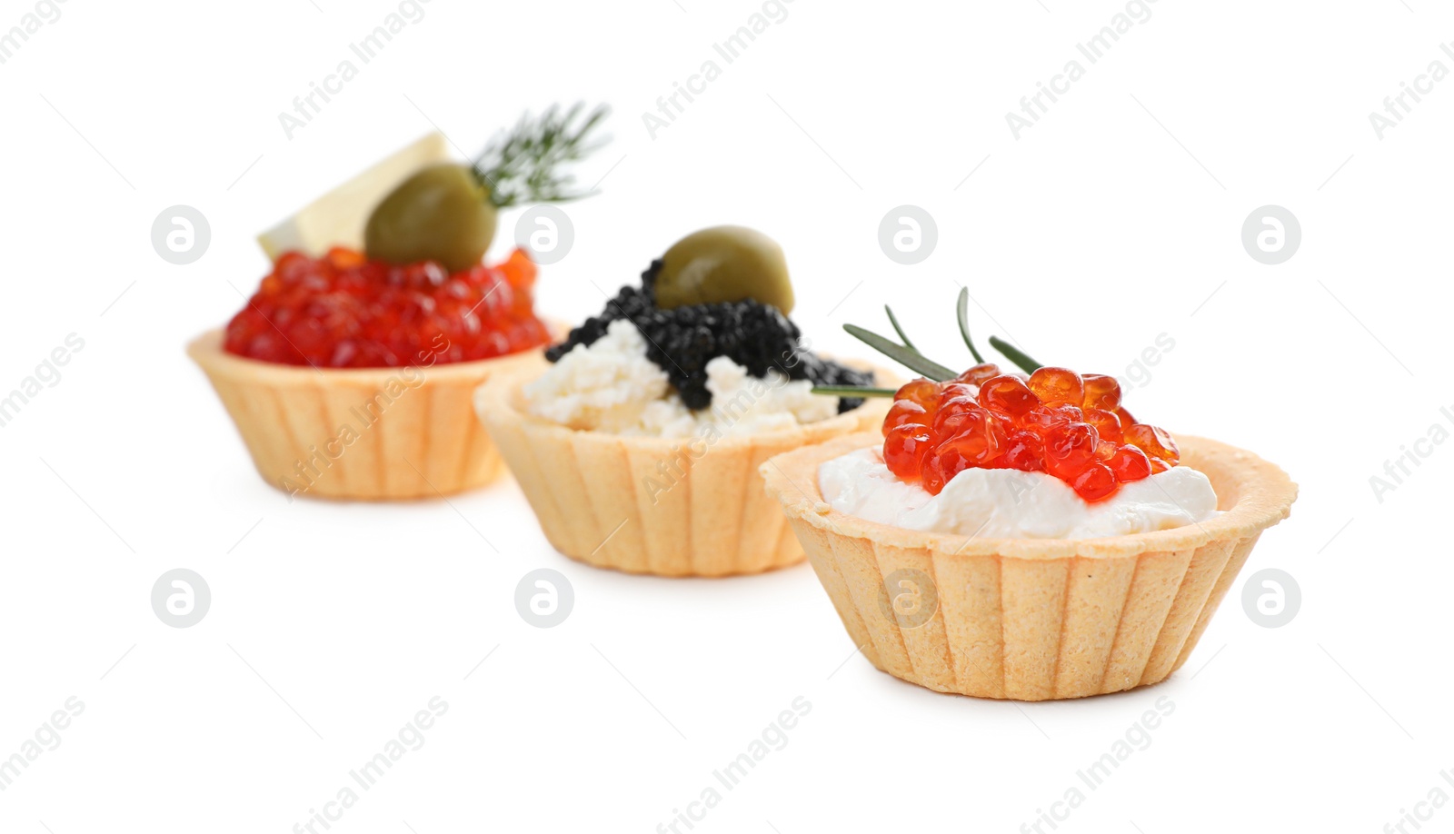 Photo of Delicious tartlets with red and black caviar on white background