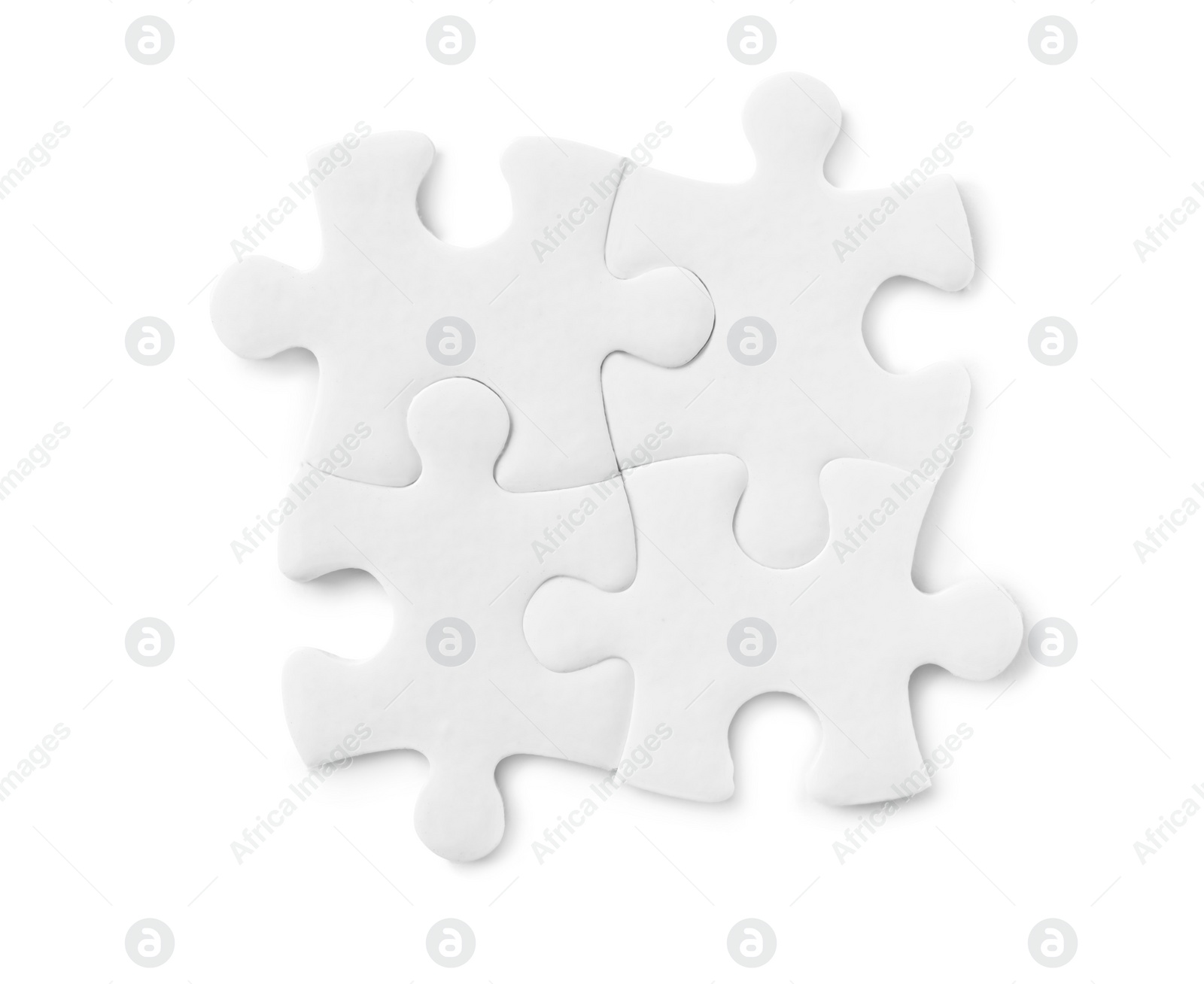 Photo of Blank puzzle pieces isolated on white, top view