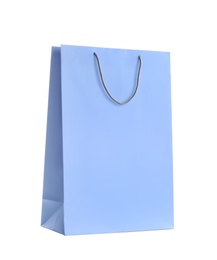 Photo of Light blue paper shopping bag isolated on white