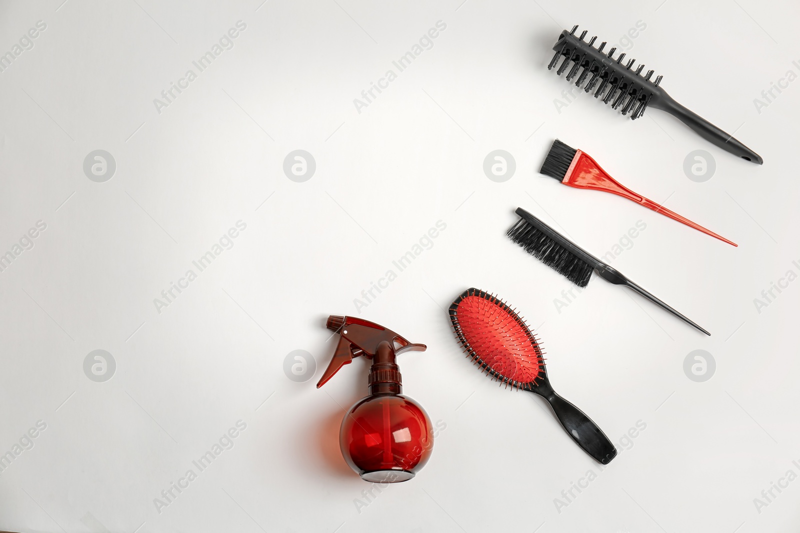 Photo of Professional hairdresser tools on white background