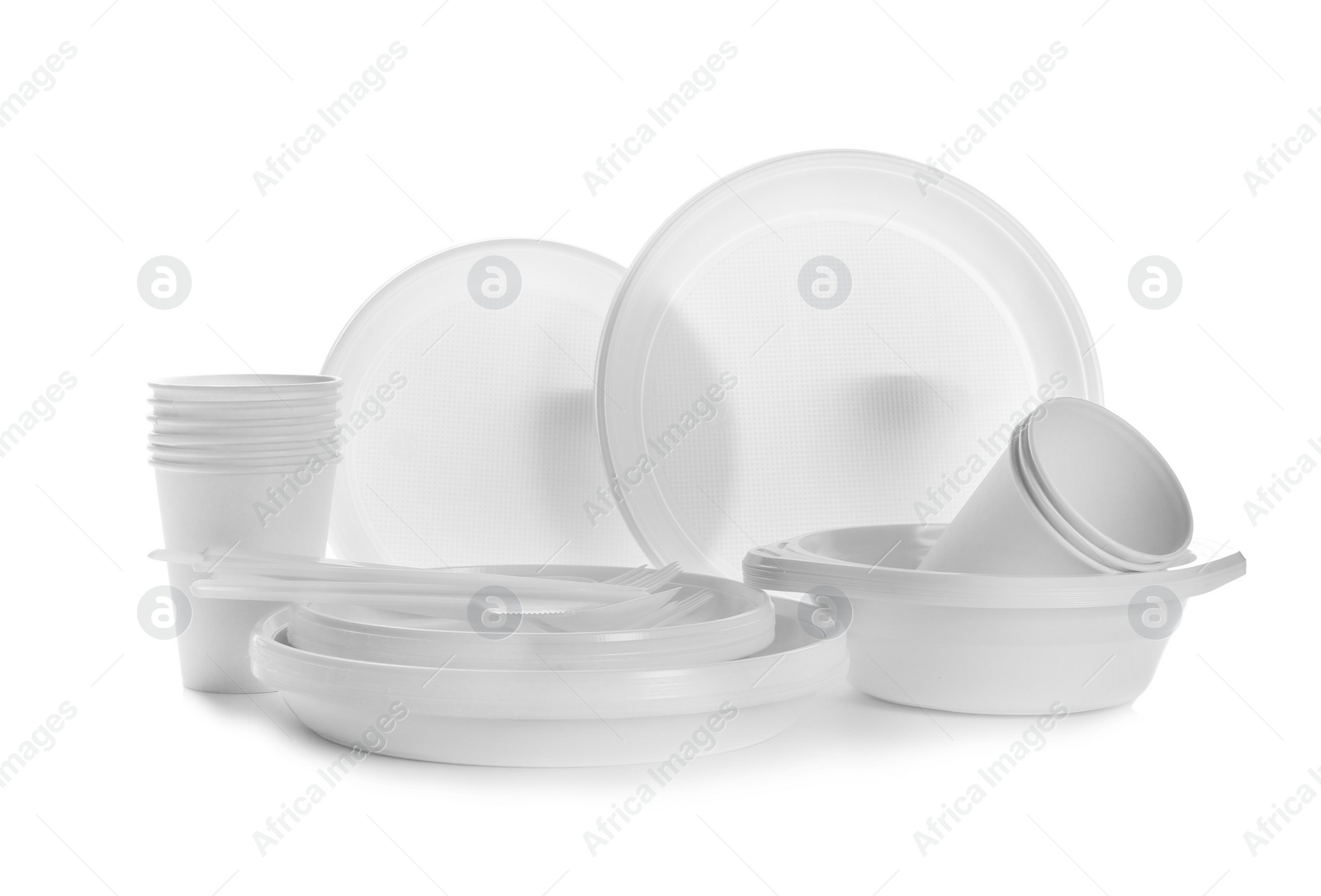 Photo of Plastic dishware isolated on white. Picnic table setting