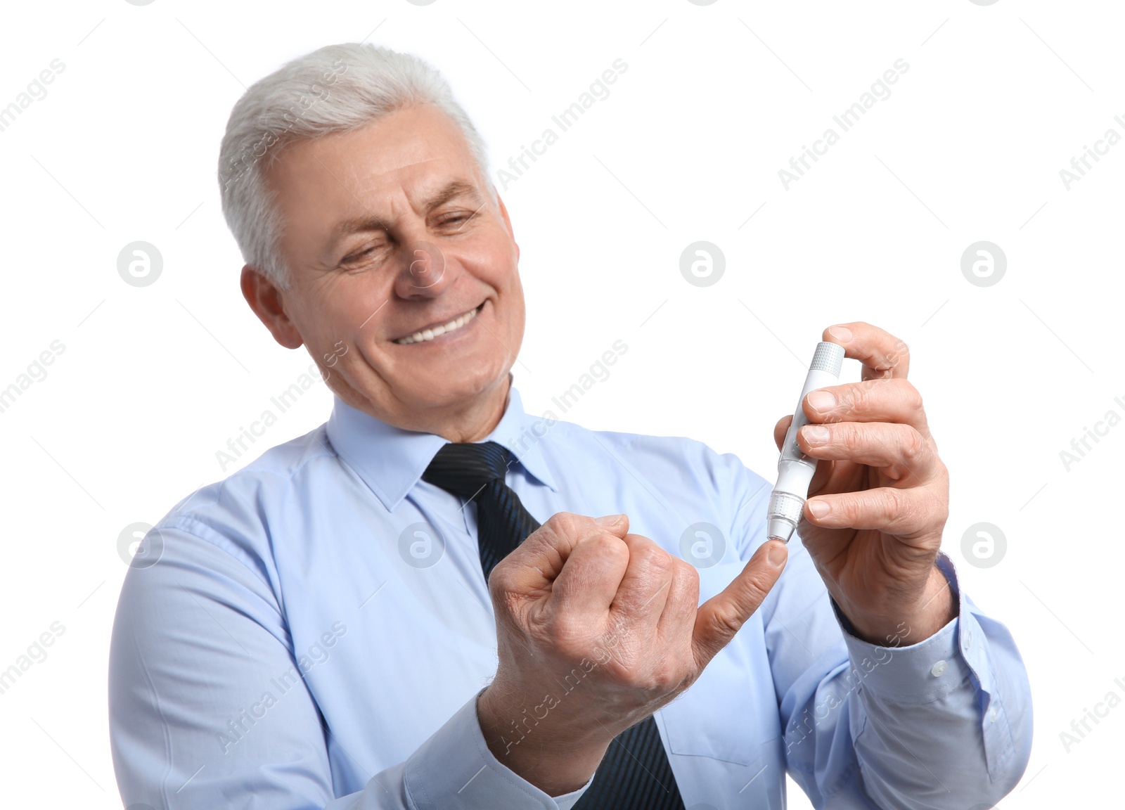 Photo of Senior man using lancet pen on white background. Diabetes control