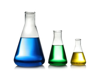 Photo of Erlenmeyer flasks with color liquid isolated on white. Solution chemistry