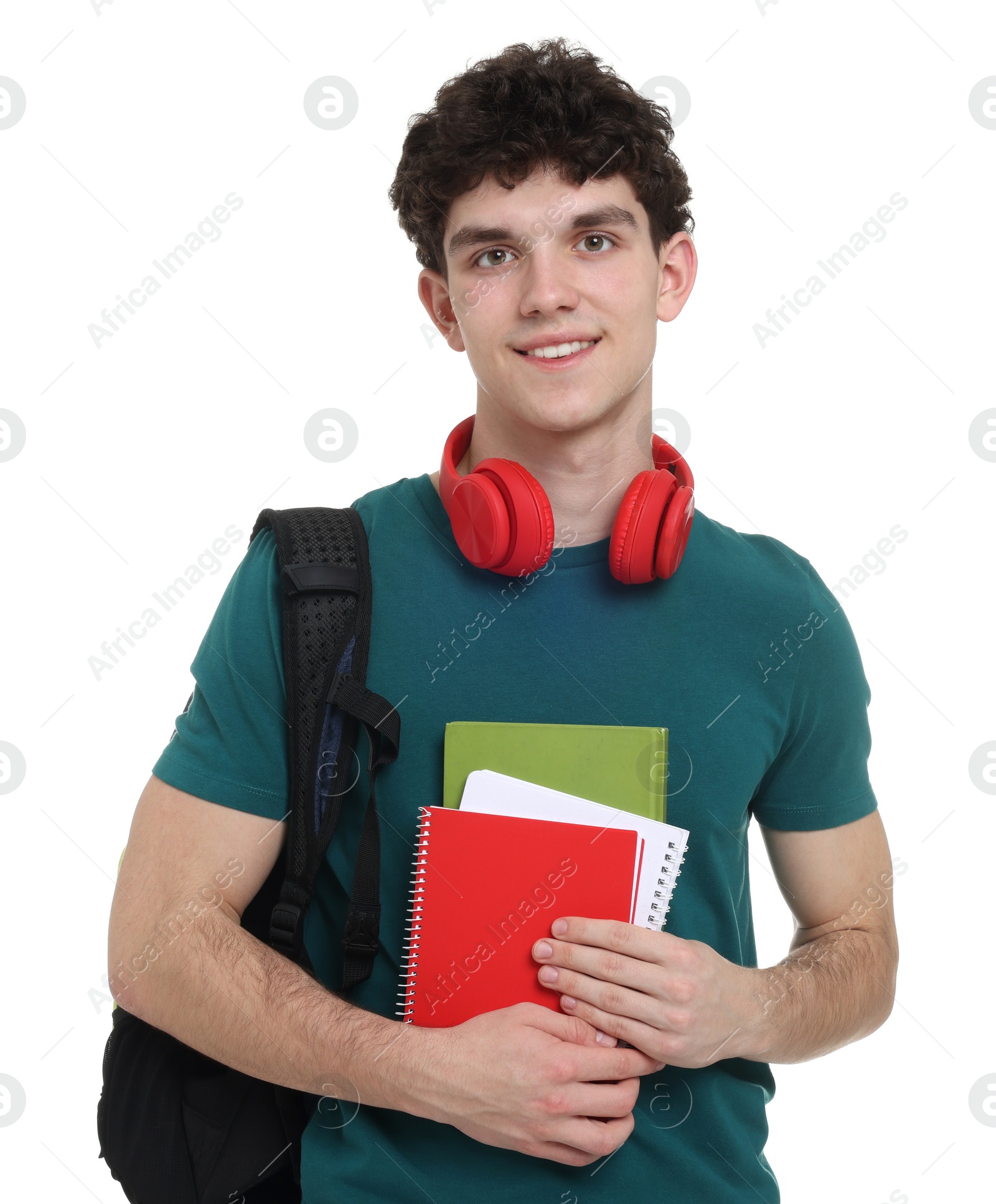 Photo of Portrait of student with backpack, notebooks and headphones on white background