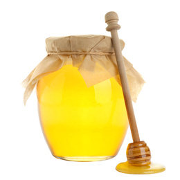 Photo of Glass jar of acacia honey and wooden dipper isolated on white