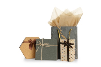 Photo of Paper bags and gift boxes isolated on white