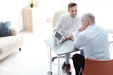 Photo of Human resources manager conducting job interview with applicant in office