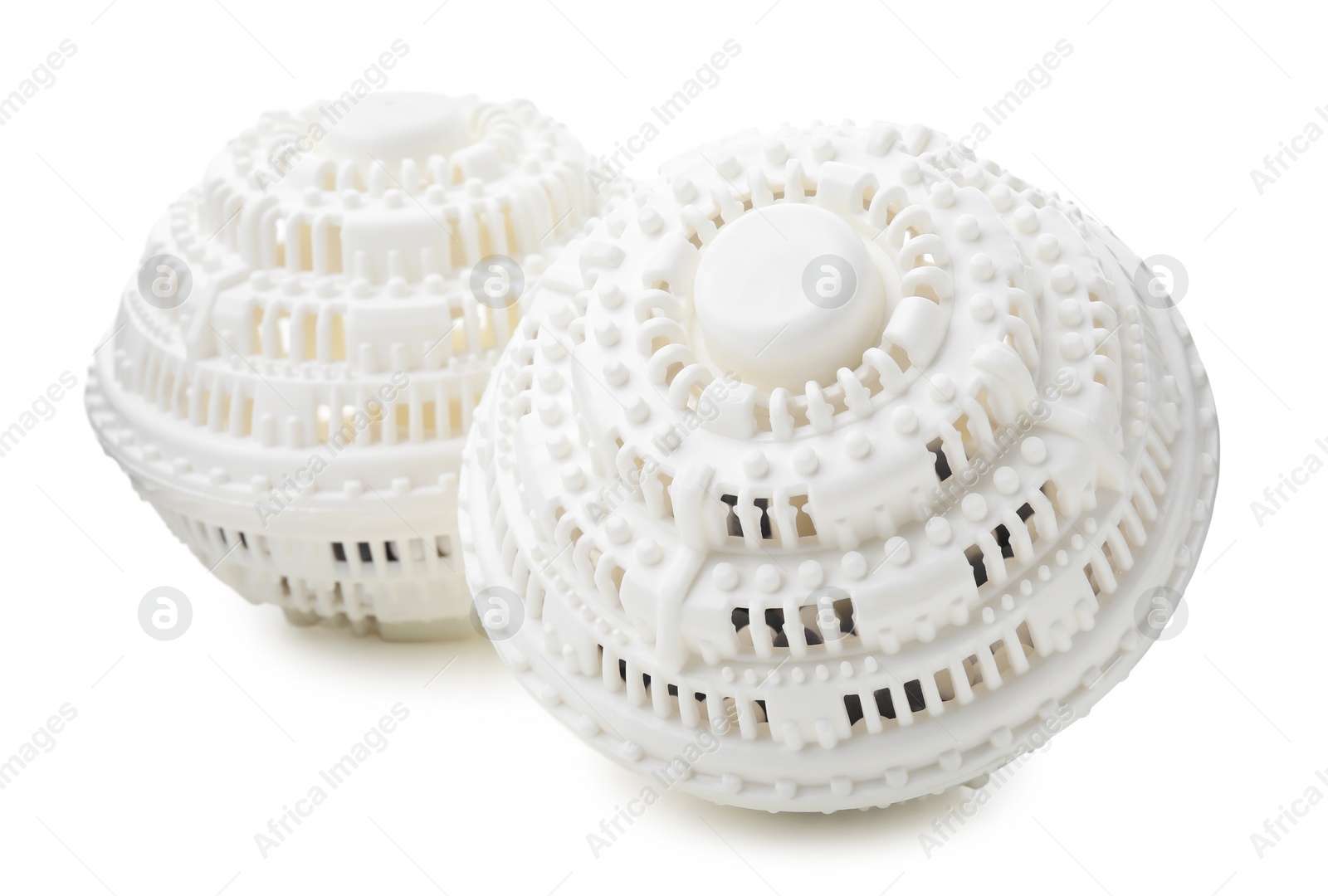 Photo of Dryer balls for washing machine on white background. Laundry detergent substitute