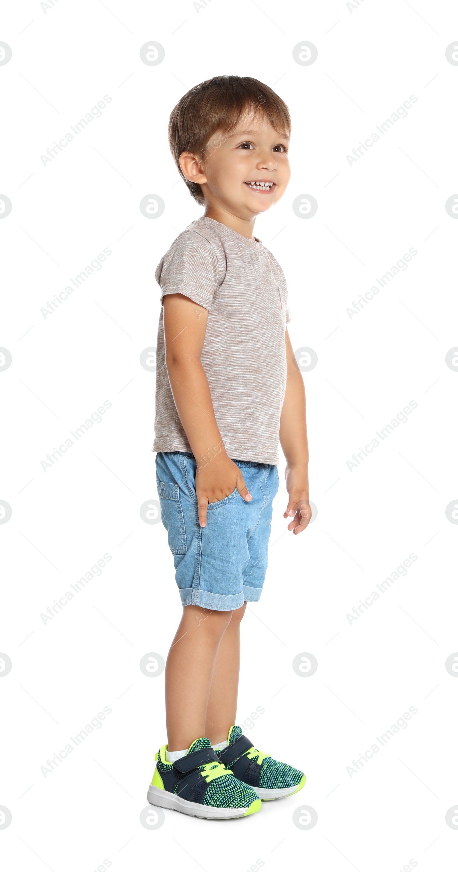 Photo of Full length portrait of cute little boy on white background