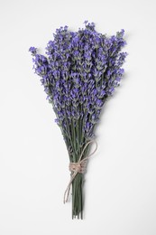 Photo of Bunch of aromatic lavender flowers on white background, top view