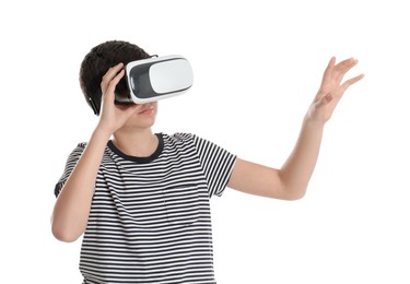 Photo of Teenage boy using virtual reality headset on white background