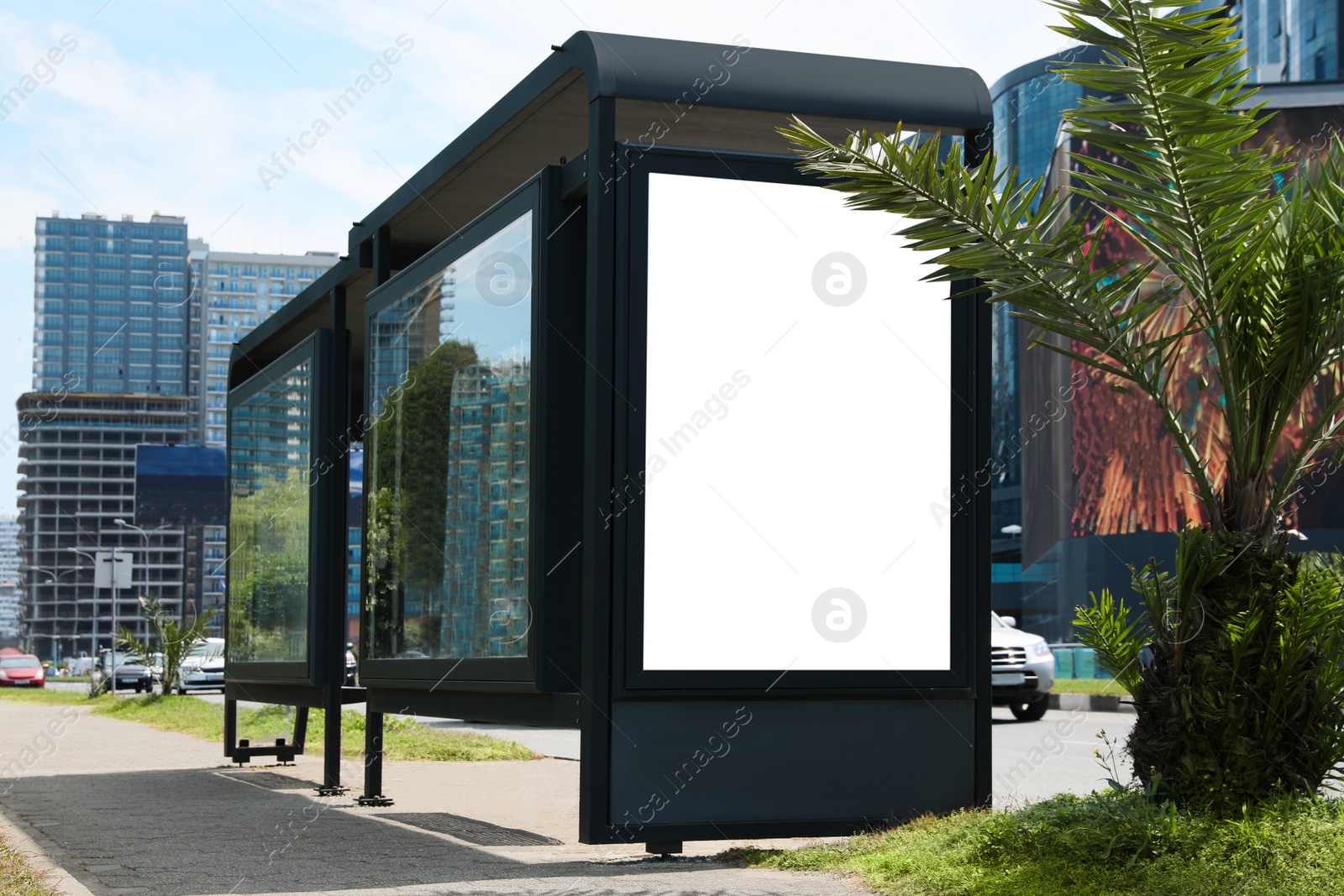 Photo of Modern public transport stop on city street