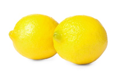 Photo of Fresh ripe whole lemons on white background