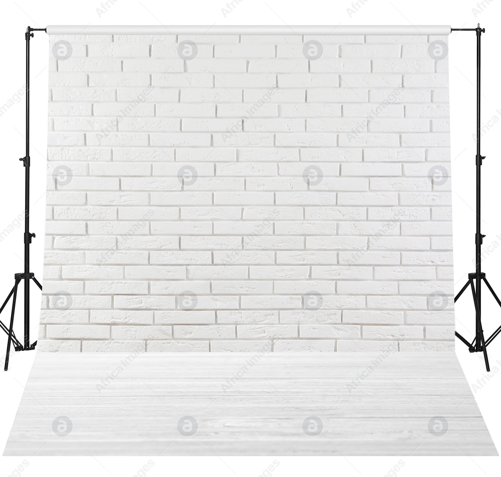 Image of Photo background with white brick wall and wooden floor. Professional studio equipment