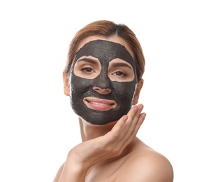 Photo of Beautiful woman with black mask on face against white background