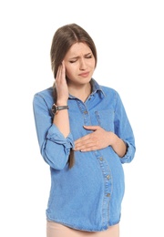 Photo of Young pregnant woman suffering from headache on white background