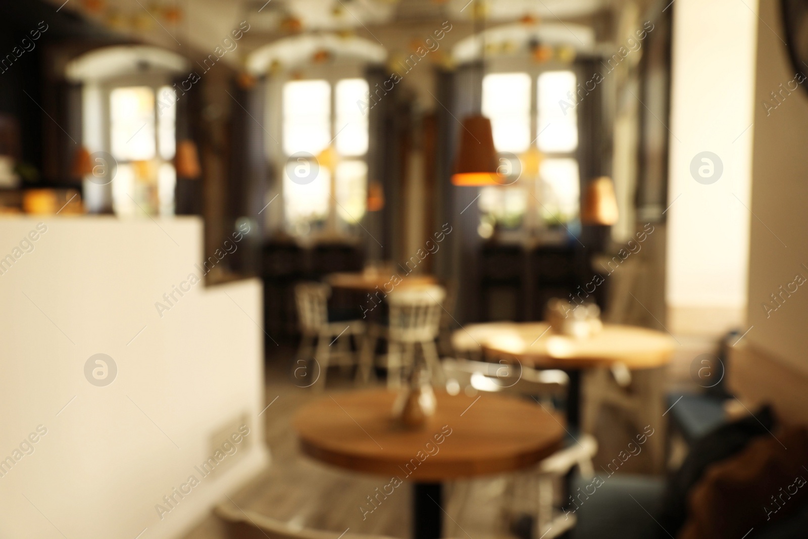 Photo of Blurred view of stylish modern cafe interior