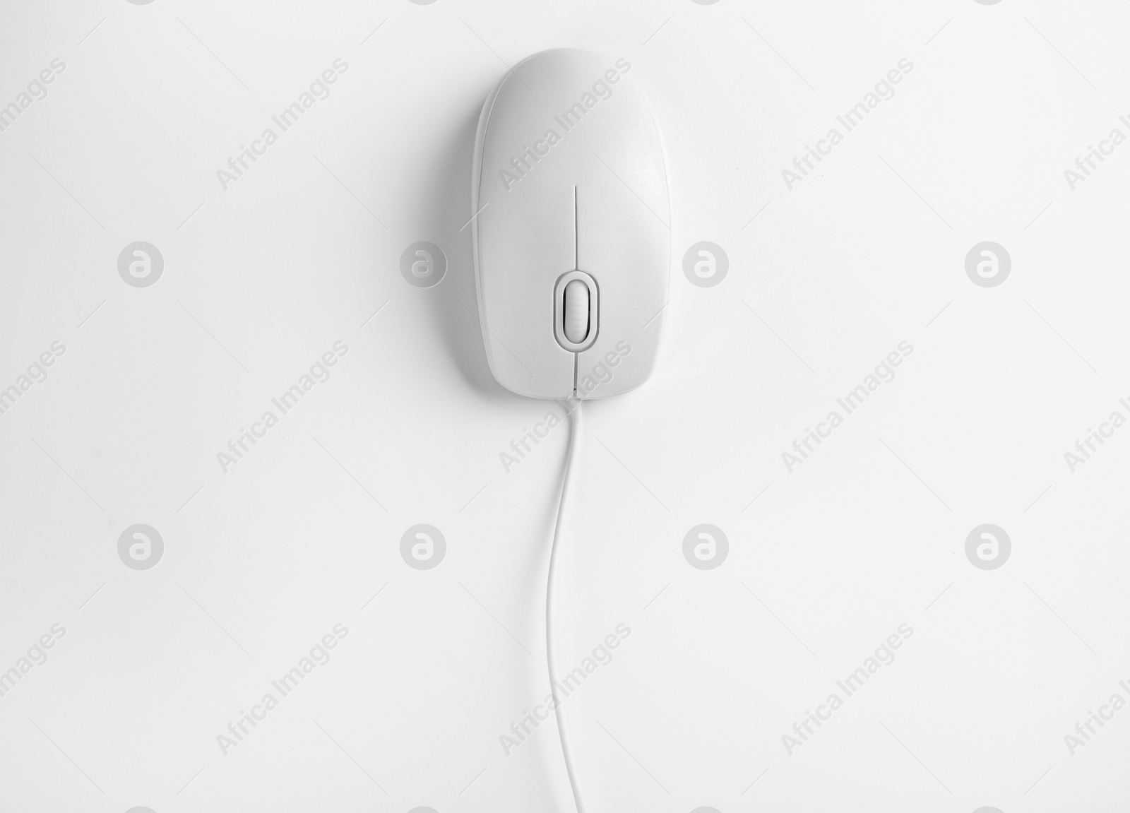 Photo of Modern wired optical mouse on white background, top view