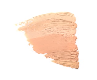 Photo of Samples of different foundation shades on white background, top view