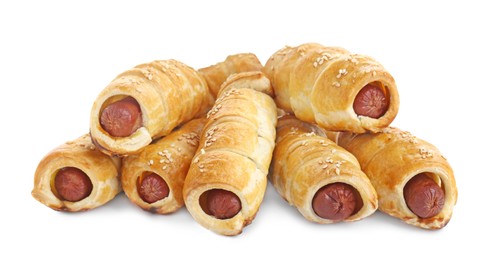 Photo of Many delicious sausage rolls isolated on white