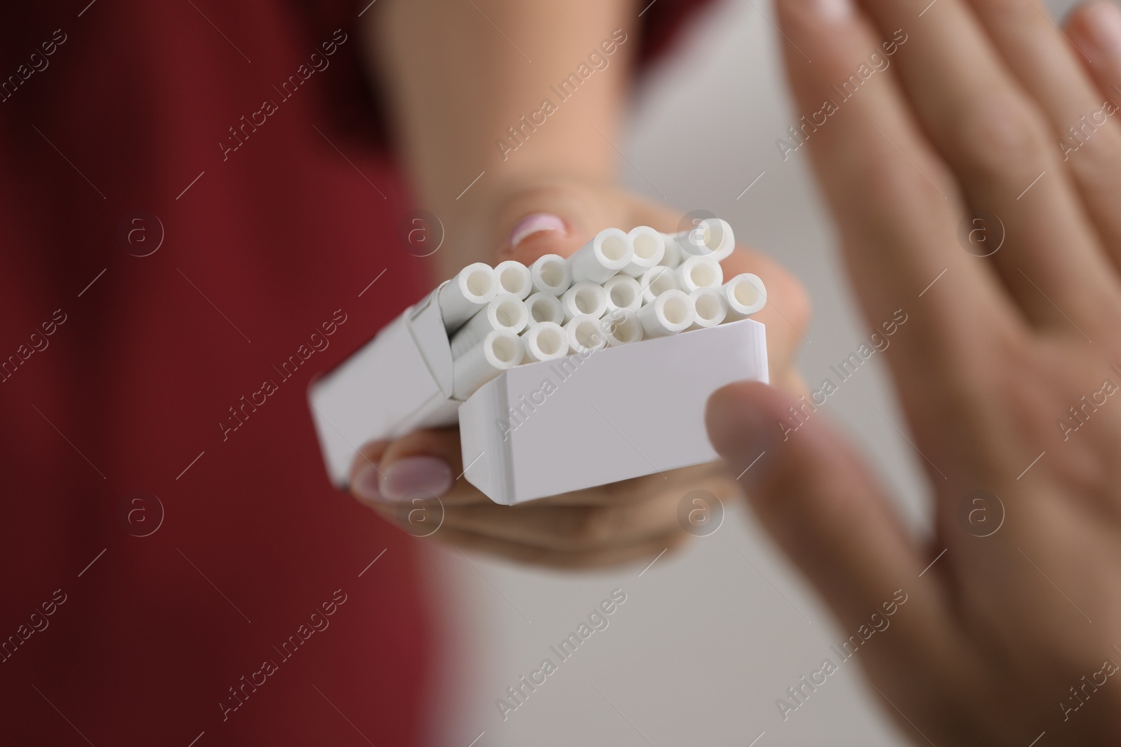 Photo of Stop smoking concept. Man refusing cigarettes, closeup