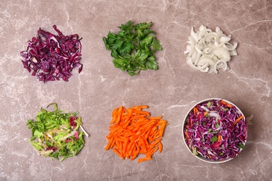 Flat lay composition with ripe red cabbage on table