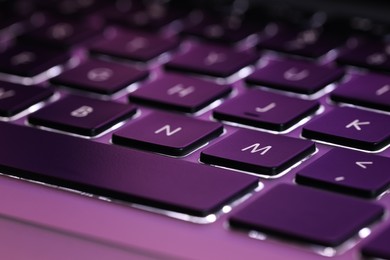 Photo of Closeup view of modern keyboard as background