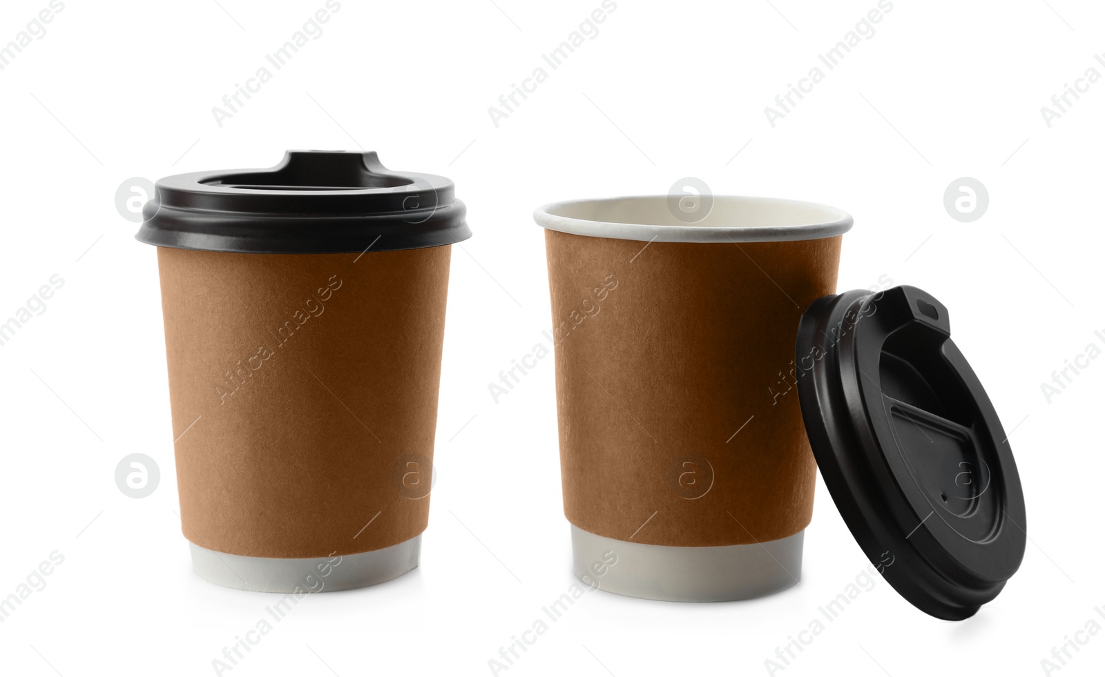 Photo of Takeaway paper coffee cups with lids on white background