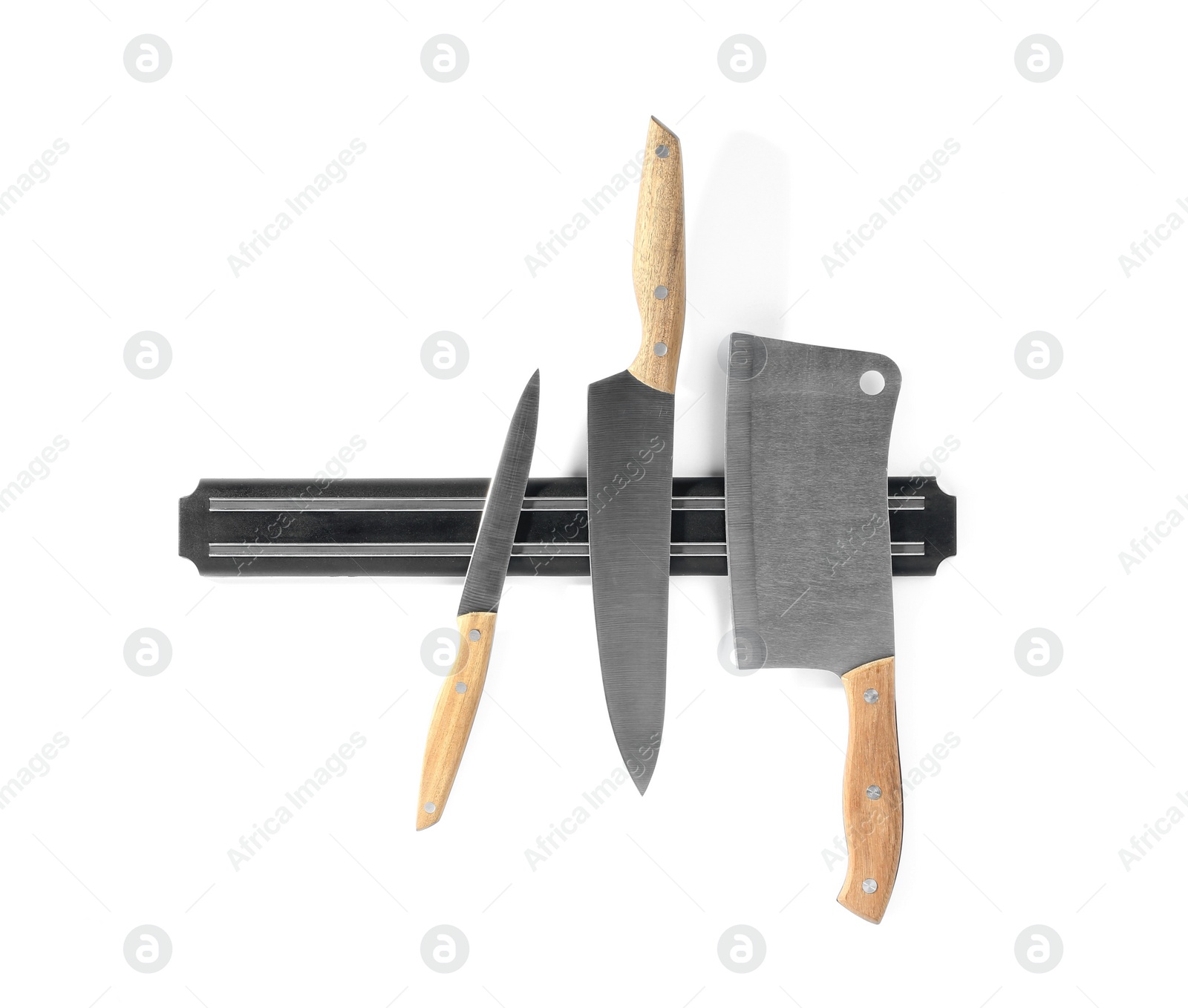 Photo of Magnetic holder with different knives isolated on white