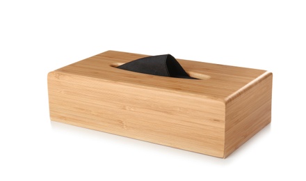 Wooden napkin holder with paper serviettes on white background