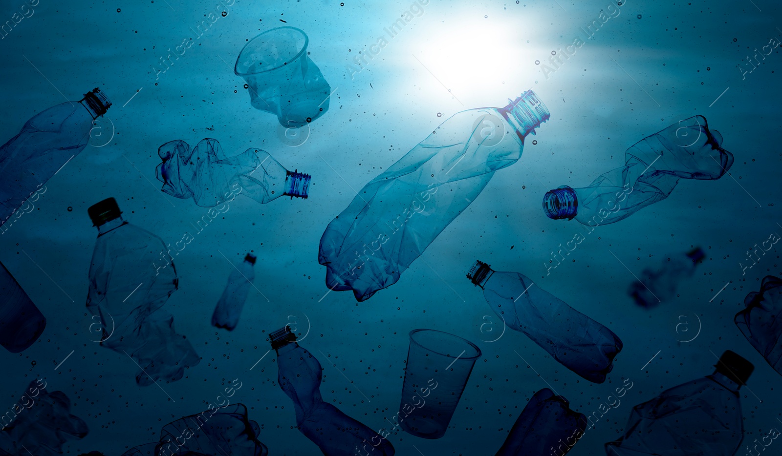 Image of Different plastic garbage in ocean, banner design. Environmental pollution