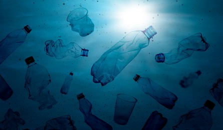 Image of Different plastic garbage in ocean, banner design. Environmental pollution