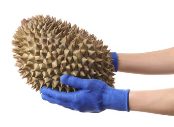 Photo of Woman in gloves holding fresh ripe durian on white background, closeup