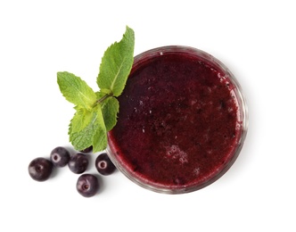 Glass with delicious acai smoothie on white background