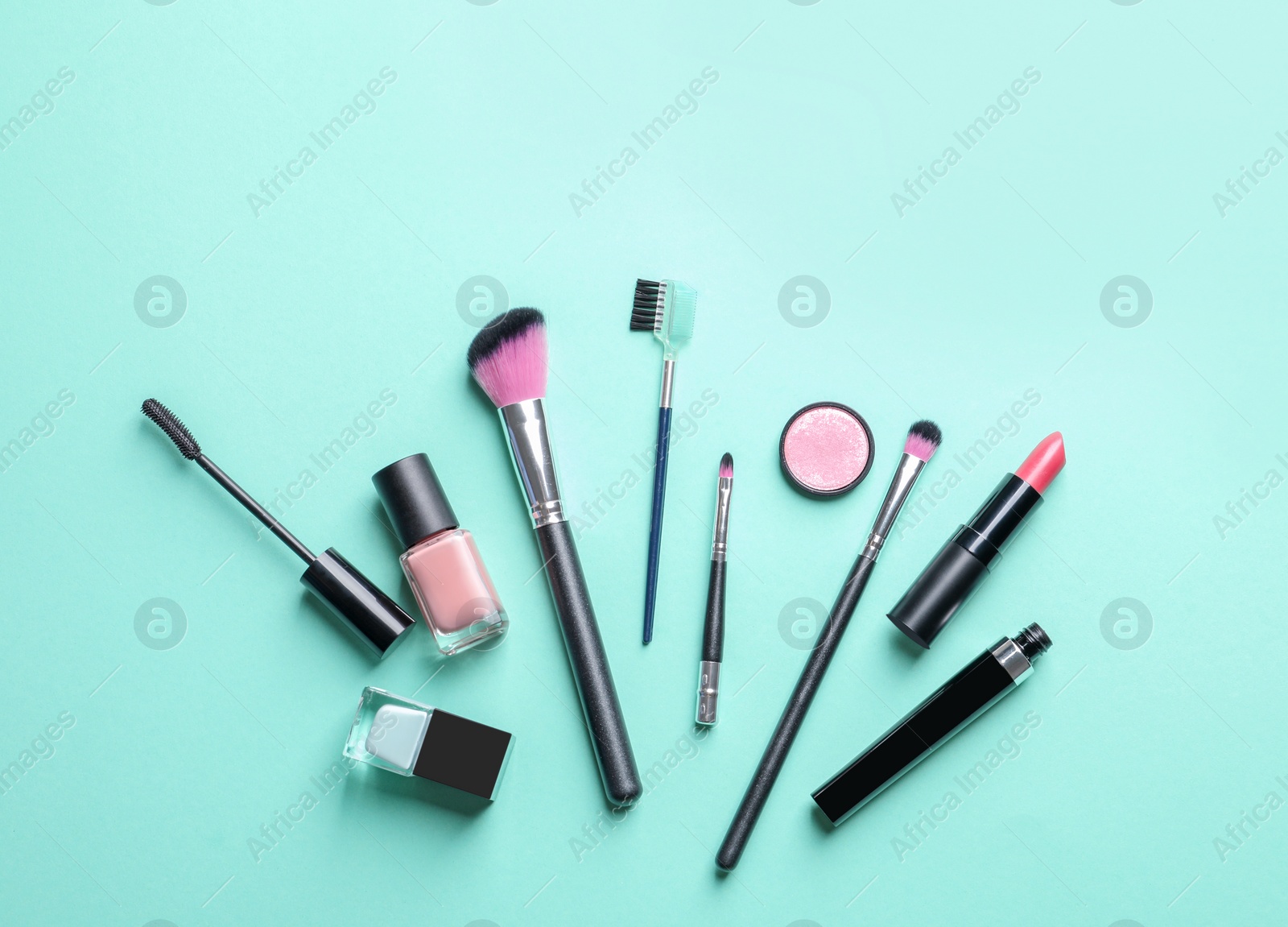 Photo of Flat lay composition with decorative cosmetics on color background