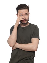 Photo of Embarrassed man covering face with hand on white background