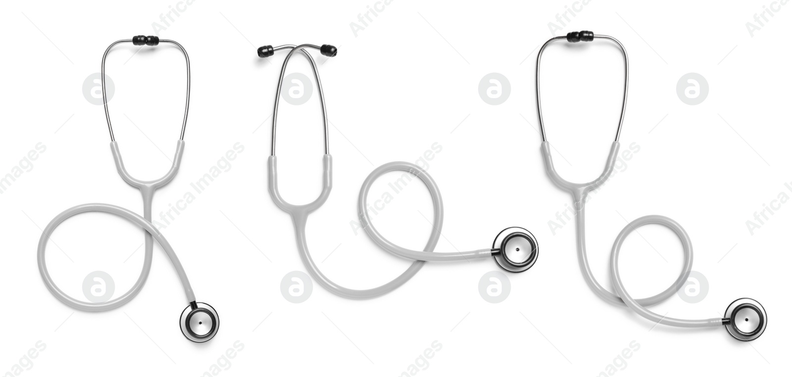 Image of Set with stethoscopes on white background, top view. Banner design