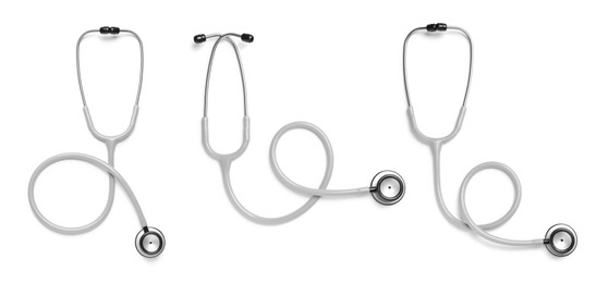 Image of Set with stethoscopes on white background, top view. Banner design