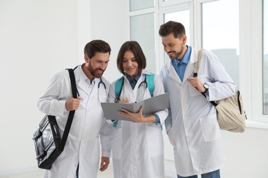 Photo of Team of medical students in college hallway
