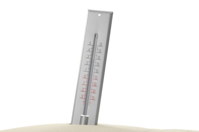 Photo of Weather thermometer in sand against white background