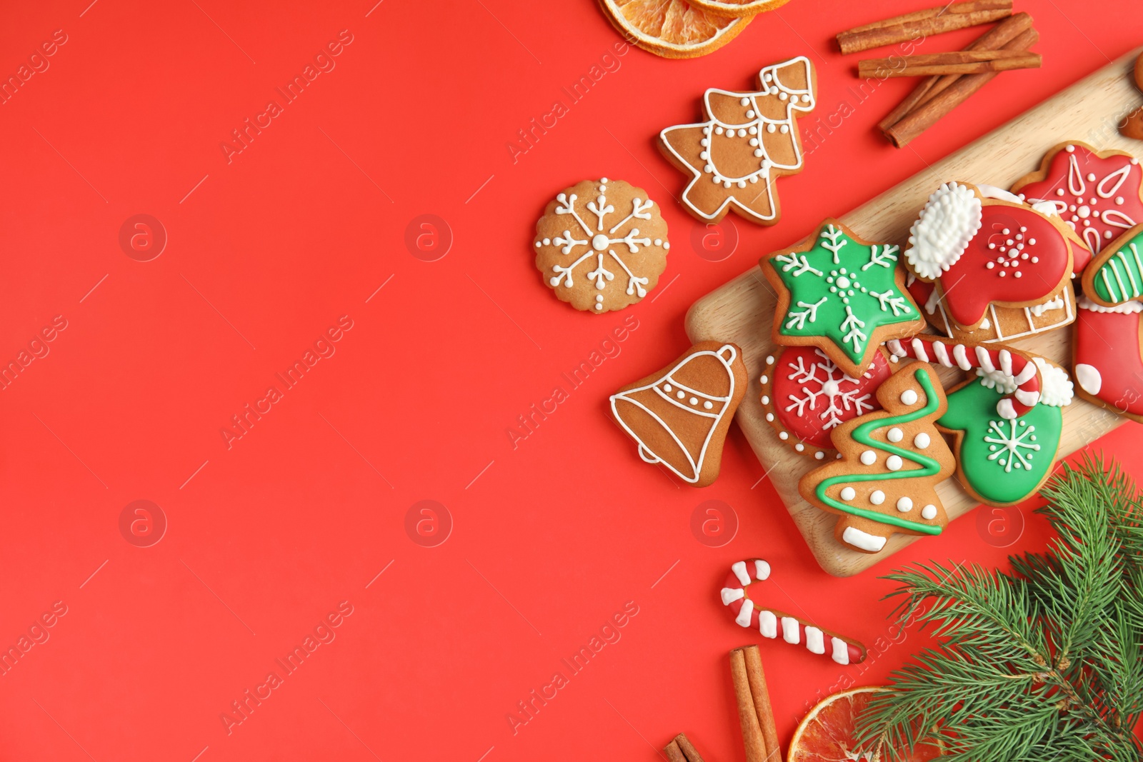 Photo of Flat lay composition with tasty homemade Christmas cookies on color background