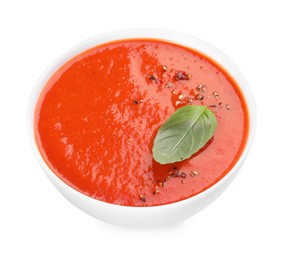 Photo of Delicious tomato soup with basil and spices isolated on white
