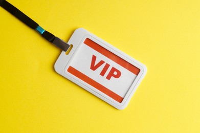 Vip badge on yellow background, top view