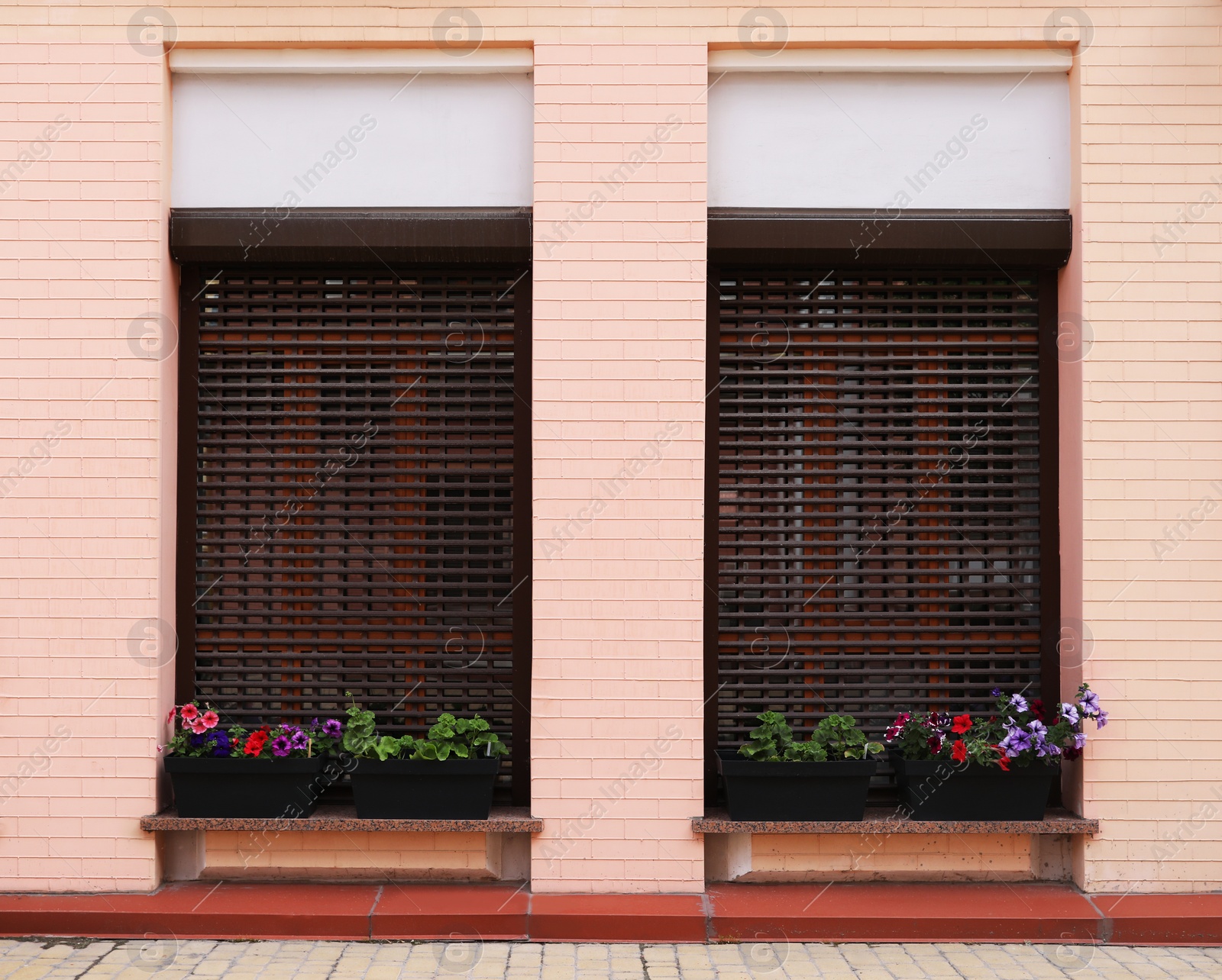 Photo of Wall of vintage building with beautiful windows