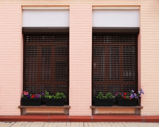 Wall of vintage building with beautiful windows