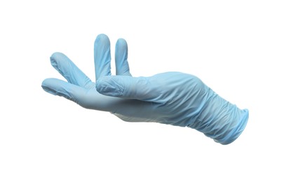 One light blue medical glove isolated on white