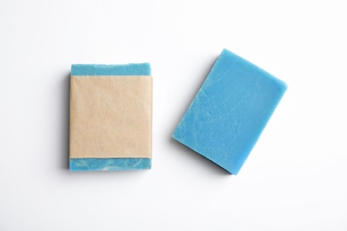 Hand made soap bars on white background, top view. Mockup for design