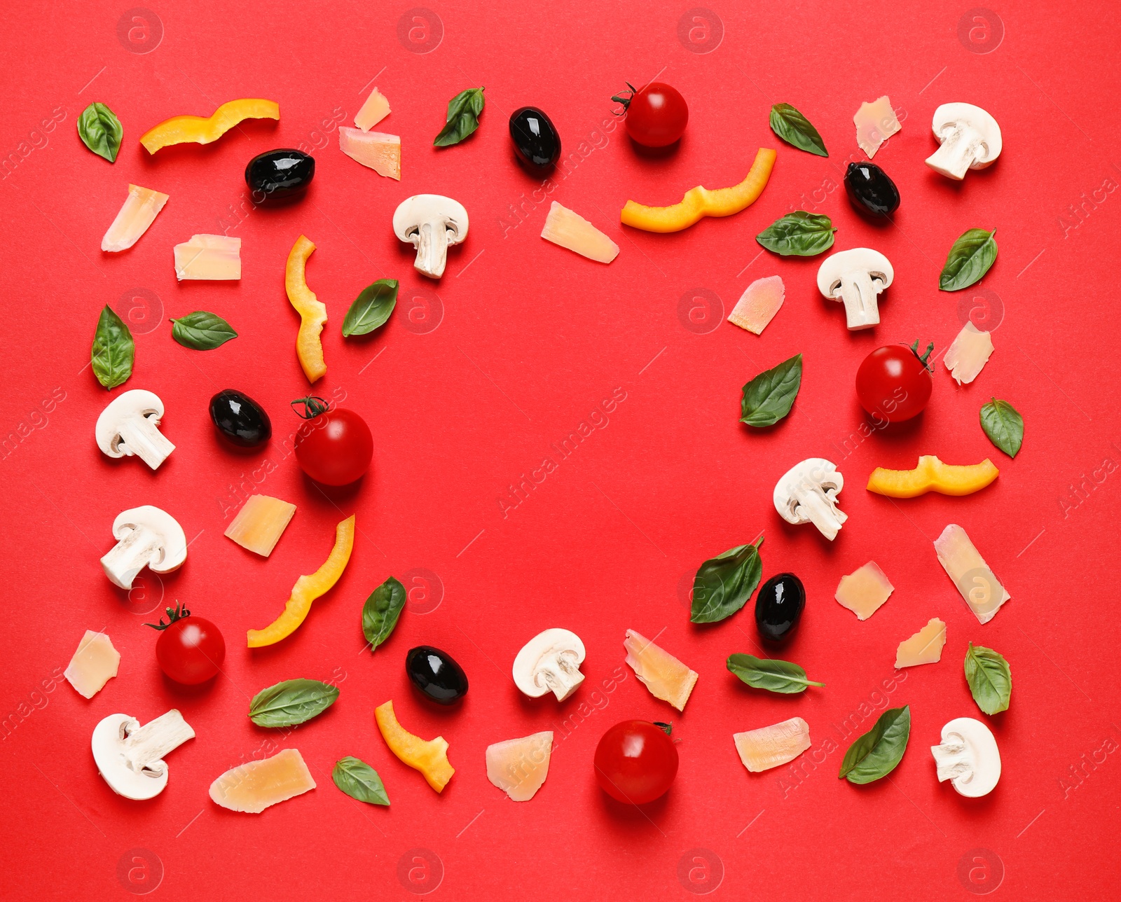 Photo of Flat lay composition with fresh pizza ingredients on red background. Space for text