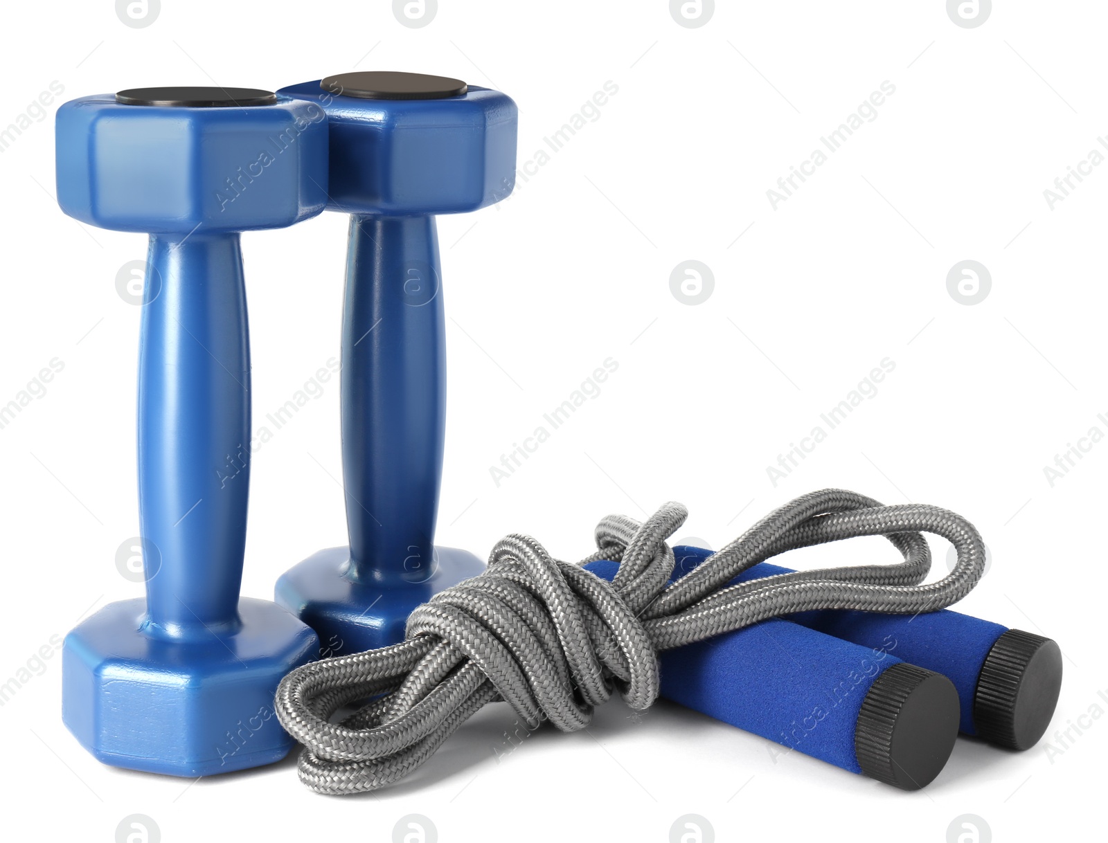 Photo of Dumbbells and skipping rope isolated on white