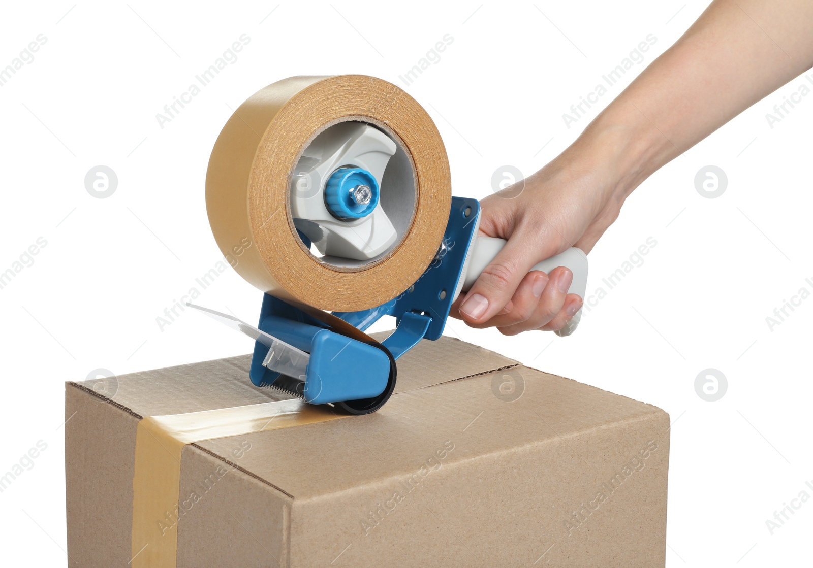 Photo of Woman applying adhesive tape on box with dispenser against white background, closeup